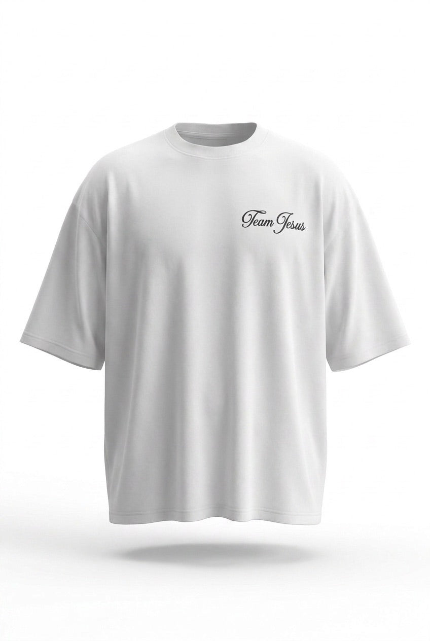 CAMISETA OVERSIZE BLANCA TEAM JESUS LETRA ROSADA