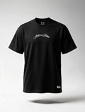 CAMISETA REGULAR UNISEX NEGRA JESUS IS LORD